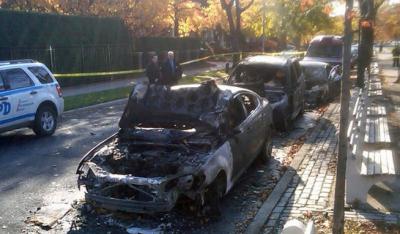 Burned-out cars in Midwood, Kristallnacht anniversary 2011